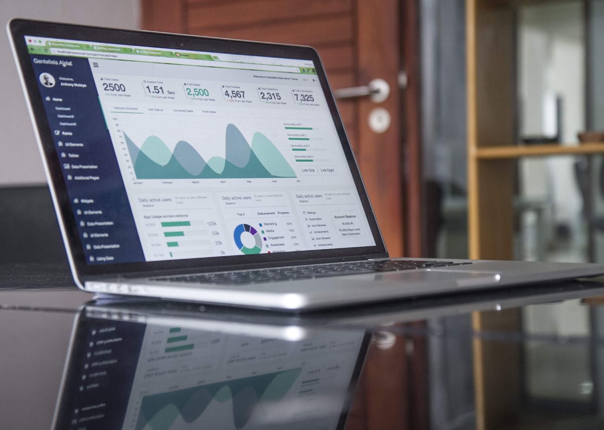 Analytics dashboard with growth charts on a laptop — app store optimization metrics