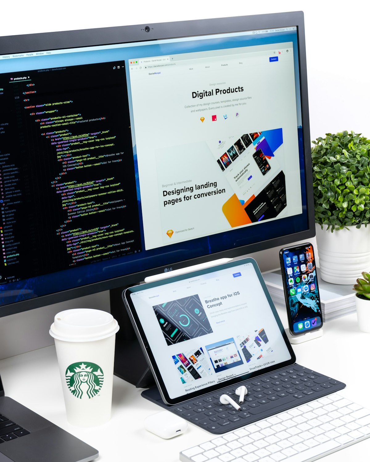 Web designer sketching website layouts next to a laptop